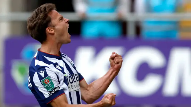 Felix Myhre celebrates scoring