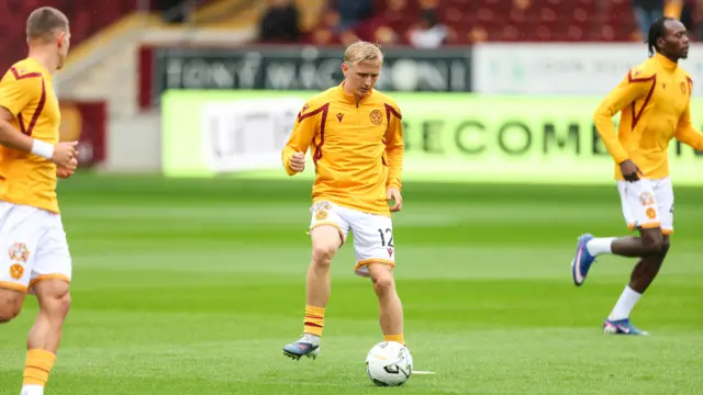 Motherwell players warming up