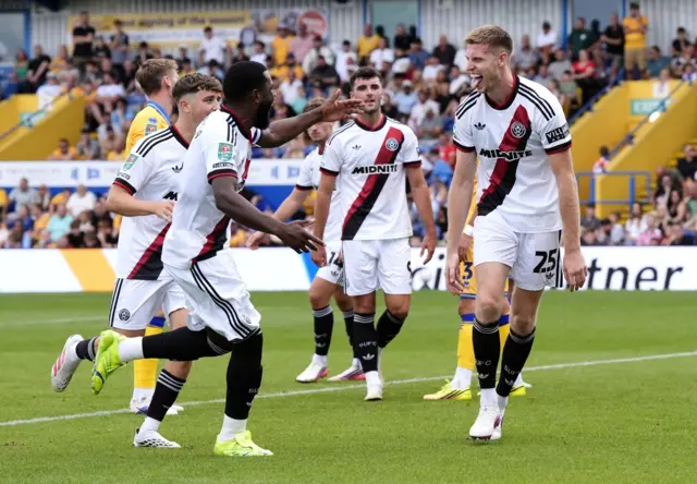 Sheffield United celebrate Mark McGuinness' goal against Mansfield Town