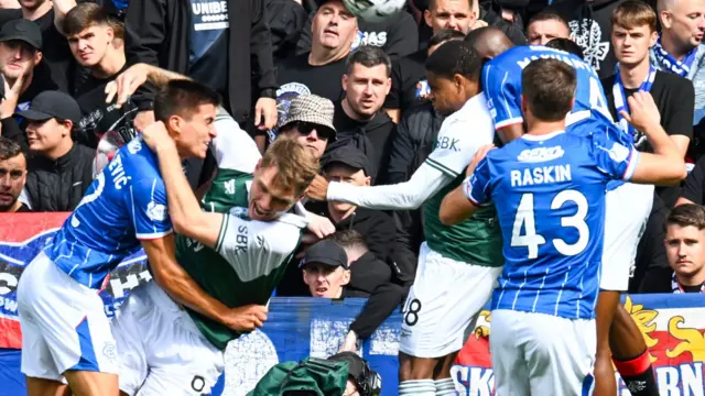 Rangers' Vanja Dragojevic concedes a penalty against Hibernian