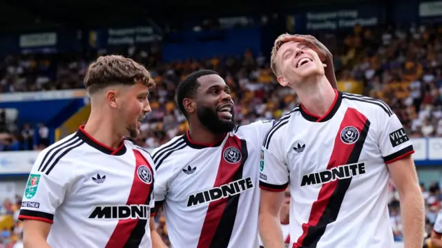 Sheffield United celebrate Mark McGuinness' goal against Mansfield Town
