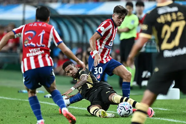 Savinho (bottom C) competes for the ball