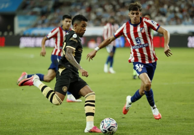 Manchester City's Savinho in action