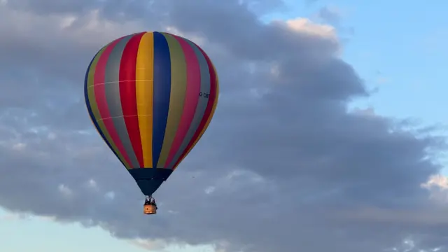 A rainbow-coloured balloon.