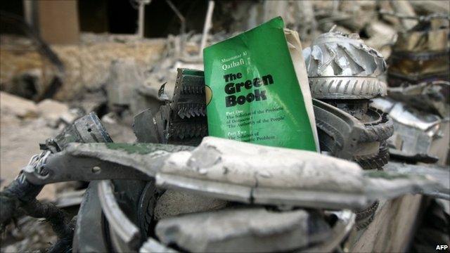 A copy of Col Gadaffi's Green Book amid rubble in Tripoli on 10/4/11