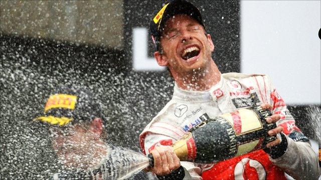 Jenson Button celebrates winning the Canadian Grand Prix