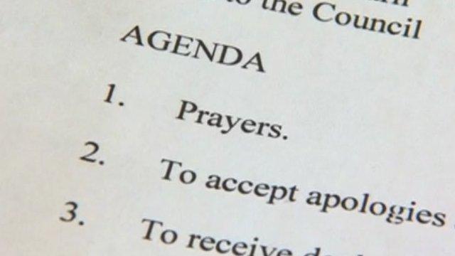 Agenda with prayers as the first item