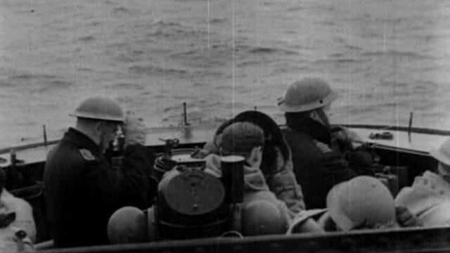 Men in a boat during World War II (Picture: British Pathe)