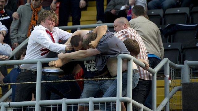 Fans fighting at Tannadice