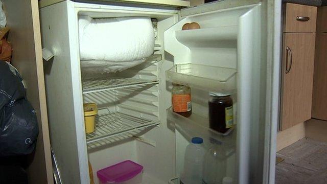 Couple's empty fridge