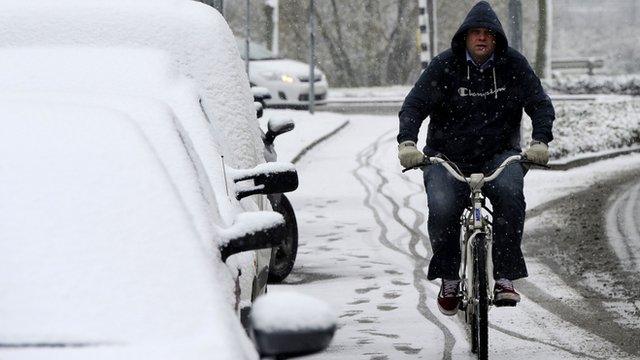 Cyclist in the snow in Den Bosch, Netherlands - file pic