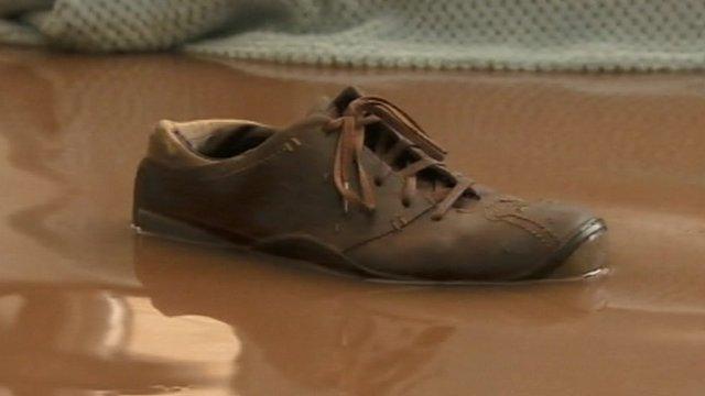 Shoe inside a flooded house