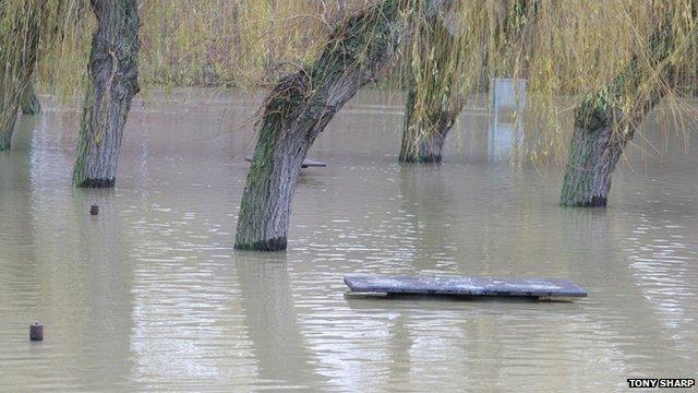 Picnic benches under flood water at the Embankment in Wellingborough