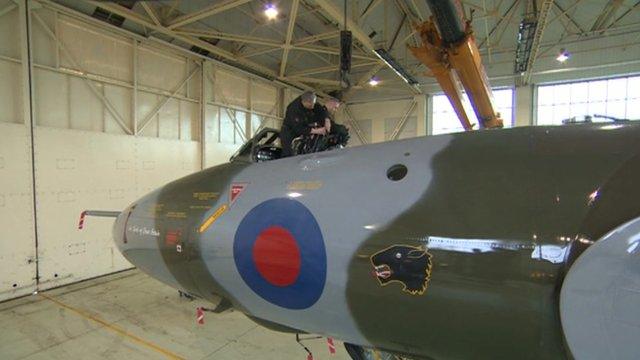 Men working on the last remaining Vulcan aircraft