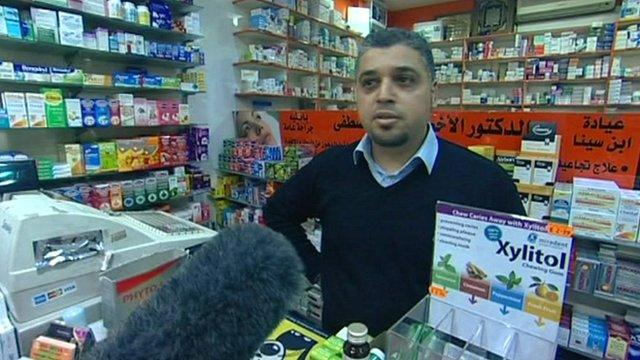 Chemist behind counter