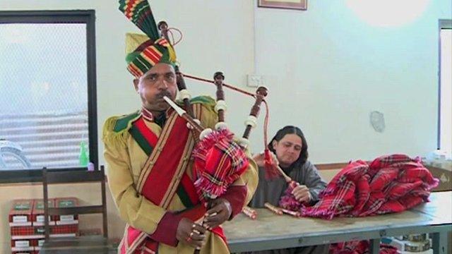 A bagpipe being played in the factory in Pakistan