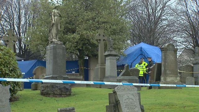 Police at grave site in Old Monkland Cemetery