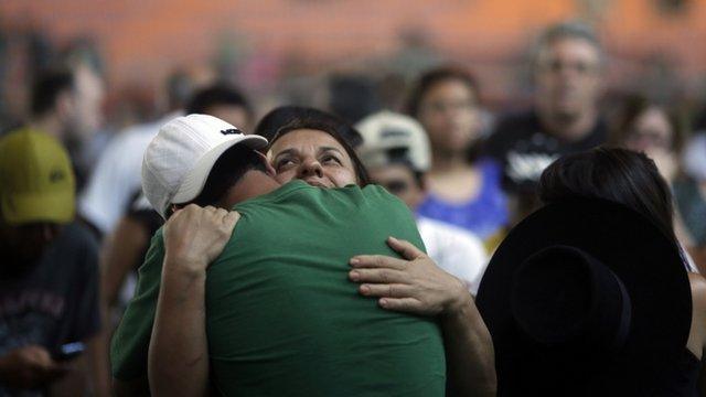 Relatives of victims of the fire at Boate Kiss nightclub, Brazil, attend a wake in the southern city of Santa Maria