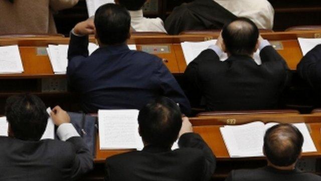 Delegates at the third plenary session of the National People"s Congress (NPC) at the Great Hall of the People in Beijing March 10, 2013.