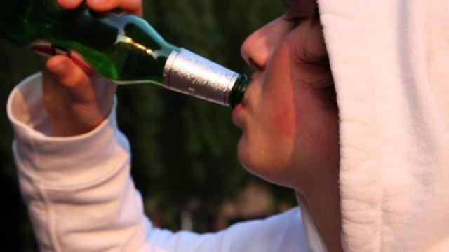 Boy drinking beer