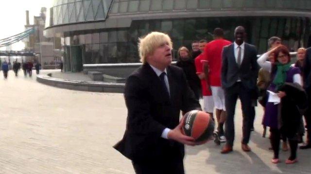 London Mayor Boris Johnson with a basketball