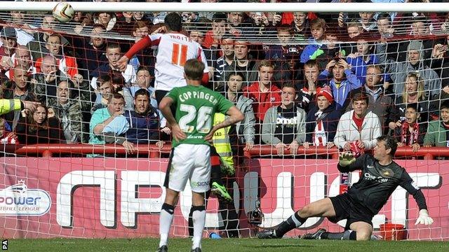 Marcello Trotta's penalty comes off the bar