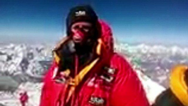 Daniel Hughes at the top of Mount Everest