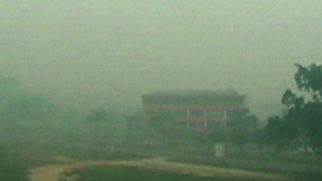 Thick smog obscuring view of buildings