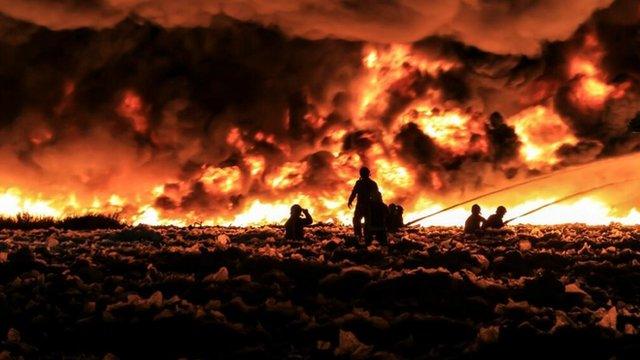 Firefighters tackle a large blaze at a recycling centre in Smethwick near Birmingham