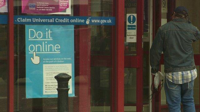 A man enters a Job Centre