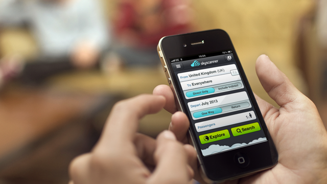 Smartphone with Skyscanner app