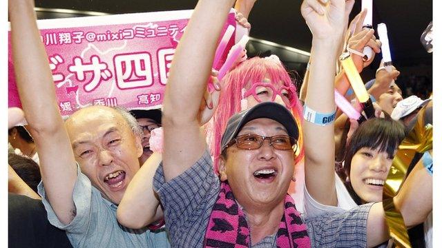 Japanese supporters of the Tokyo bid 2020 team celebrate in Tokyo