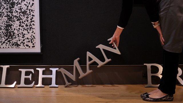 A Lehman Brothers sign is auctioned at Christies in London in 2010