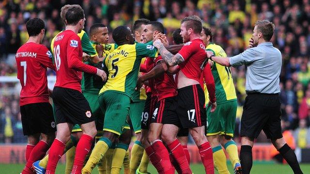 Norwich and Cardiff players argue