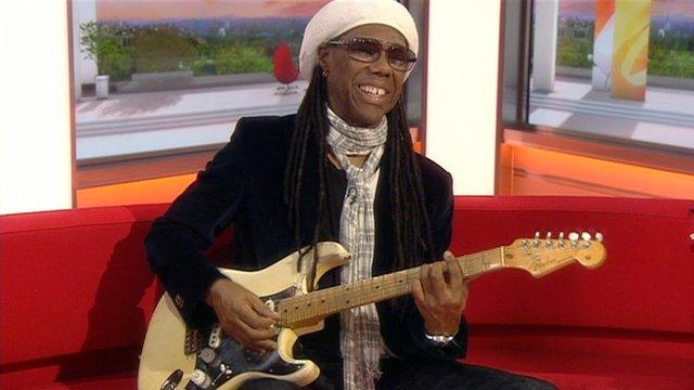 Musician Nile Rodgers performs on the BBC Breakfast sofa