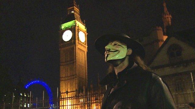 Protester in Guy Fawkes mask