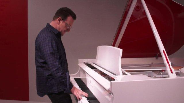 Bono playing a Steinway