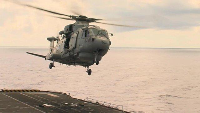 Helicopter leaving HMS Illustrious