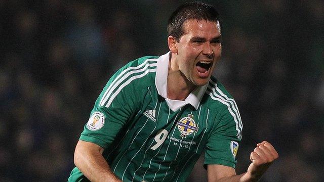 David Healy celebrates scoring against Azerbaijan