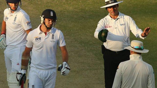 England's James Anderson and Australia's Michael Clarke