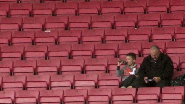 Spectators watching local rugby union team