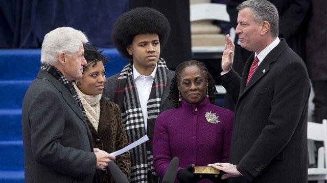 Newly elected Mayor of New York, Bill de Blasio is sworn in by former President Bill Clinton