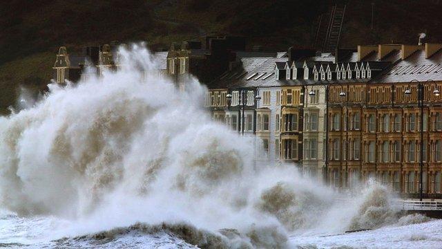 Waves crash against the Aberystwyth coastline