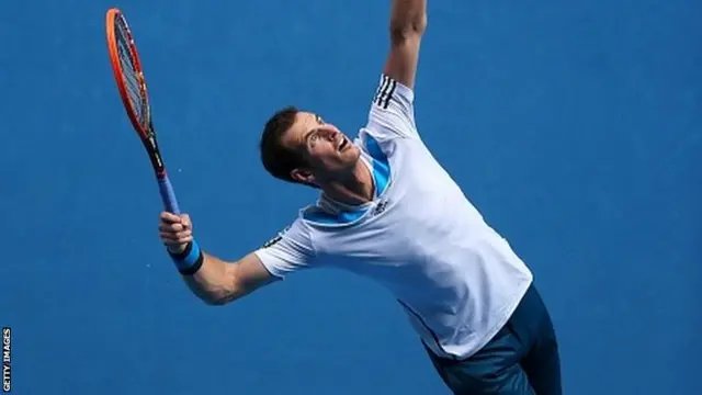 Andy Murray serves