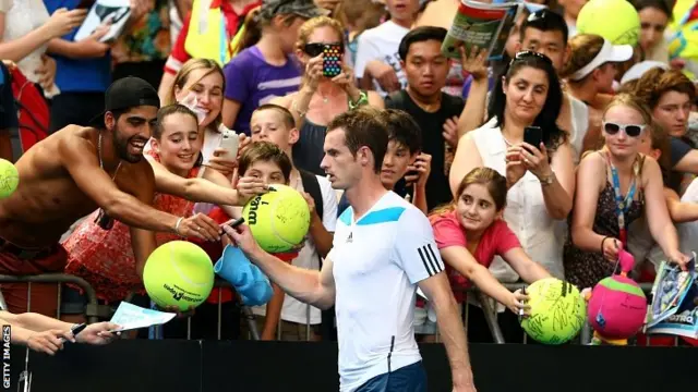 Andy Murray signs autographs