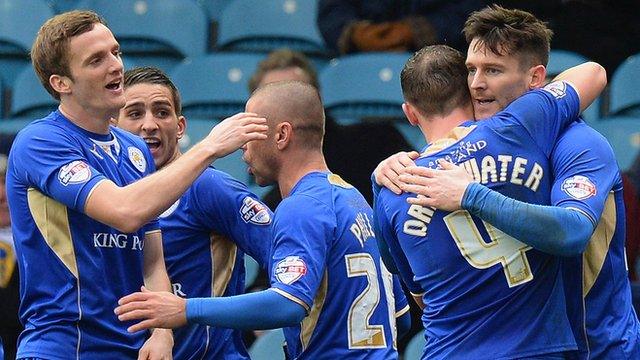 Leicester City's players celebrate their late winner against Leeds at Elland Road