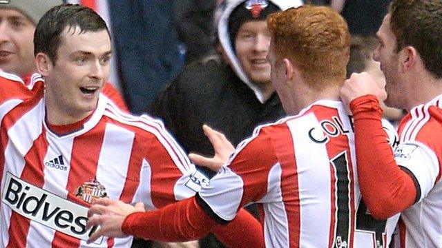 Sunderland winger Adam Johnson (left) celebrates his side's second goal against Southampton