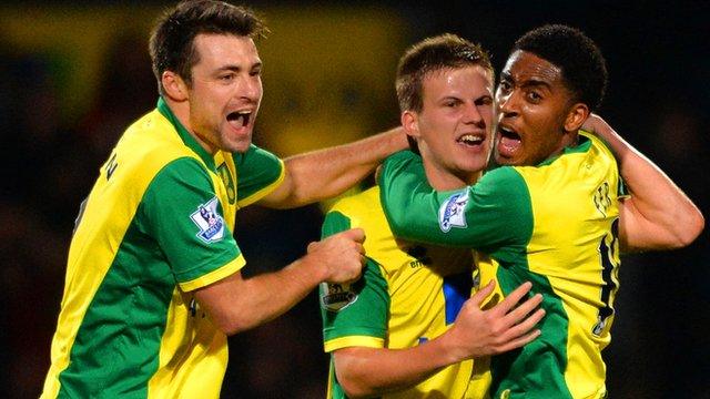 Norwich celebrate their late winner against Hull