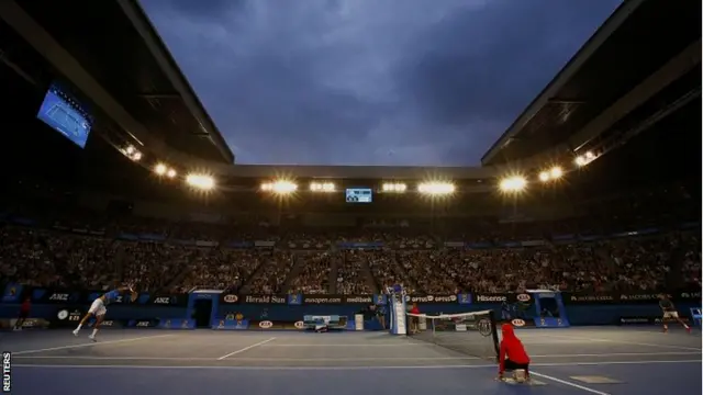 Jo-Wilfried Tsonga serves