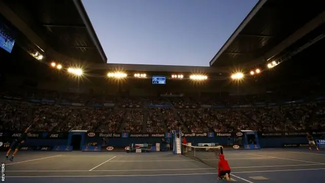 Andy Murray serves